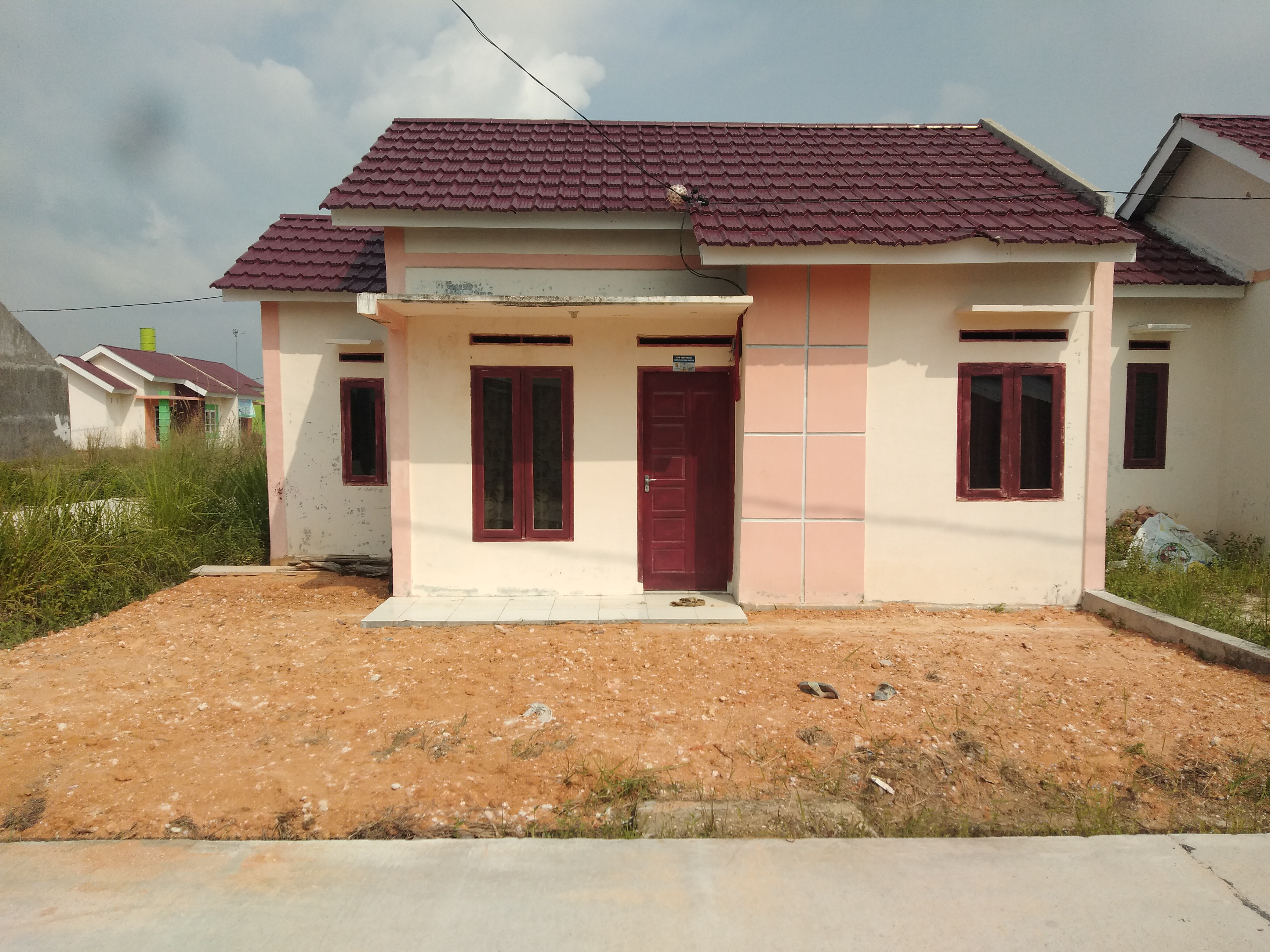 foto contoh rumah perumahan Griya Tiga Putri