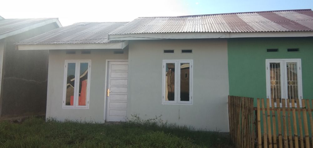 foto contoh rumah perumahan Muslim village Sang Surya Tahap II