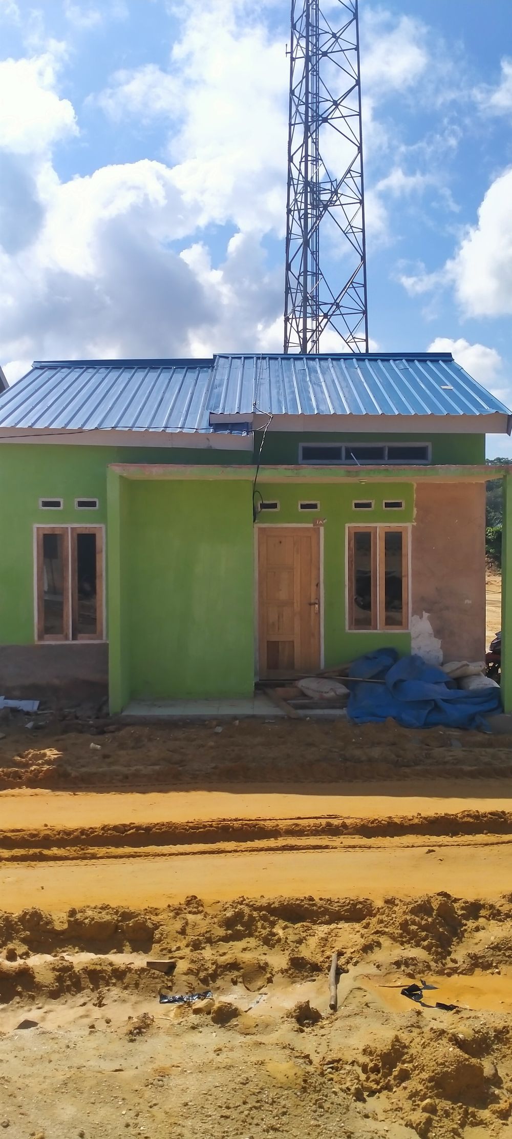foto contoh rumah perumahan SINGAPORE GOLDEN