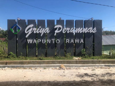 foto gerbang perumahan Perumnas Wapunto Raha