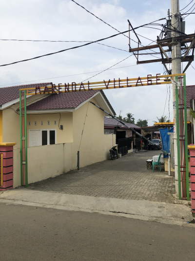 foto gerbang perumahan Marendal Village