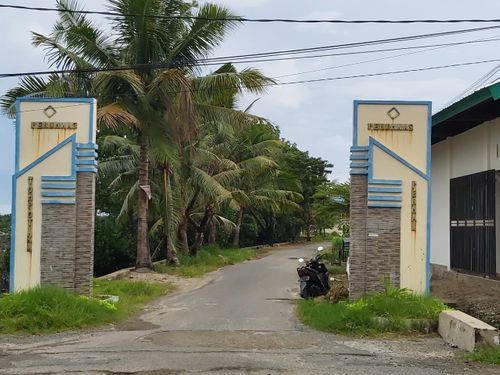 foto gerbang perumahan Perumnas Tompotika Permai