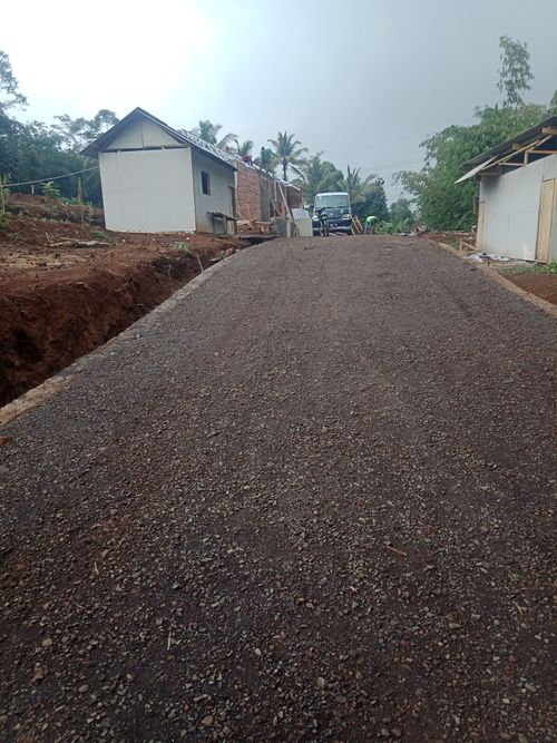 foto gerbang perumahan D'Village Bantar Huni
