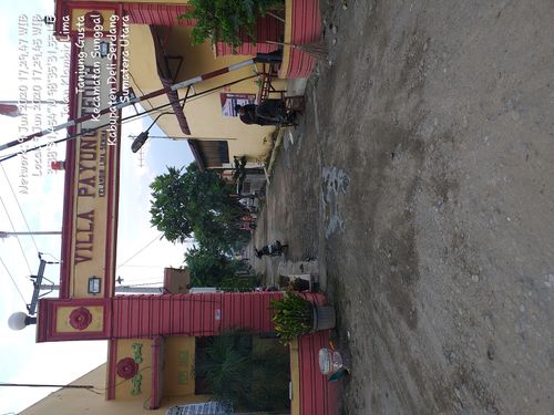 foto gerbang perumahan Villa payung teduh. 