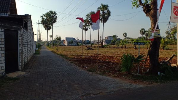 foto gerbang perumahan Maisons De la Propriete 2