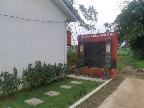 foto gerbang perumahan PESONA SUKARAYA CITY