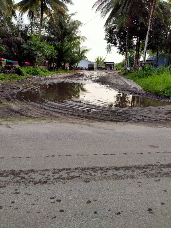 foto gerbang perumahan PERUMAHAN KOPERASI TENAGA KERJA BONGKAR MUAT INDONESIA PELABUHAN KUALA TANJUNG