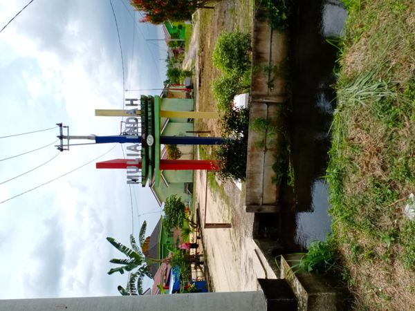 foto gerbang perumahan Mulia indah residence