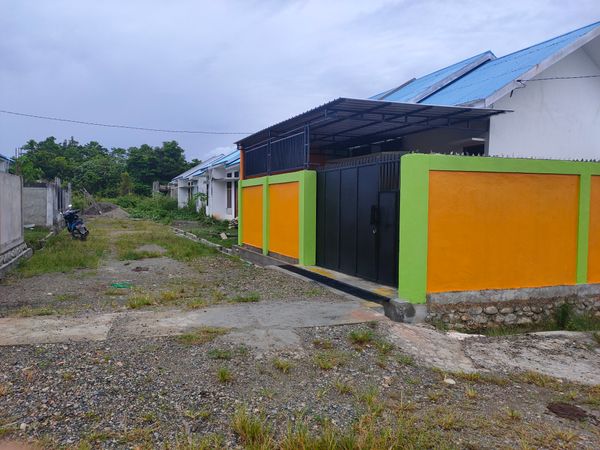 foto gerbang perumahan RAIHANA RESIDENCE