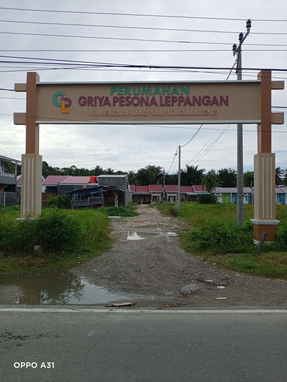 foto gerbang perumahan Griya Pesona Leppangan
