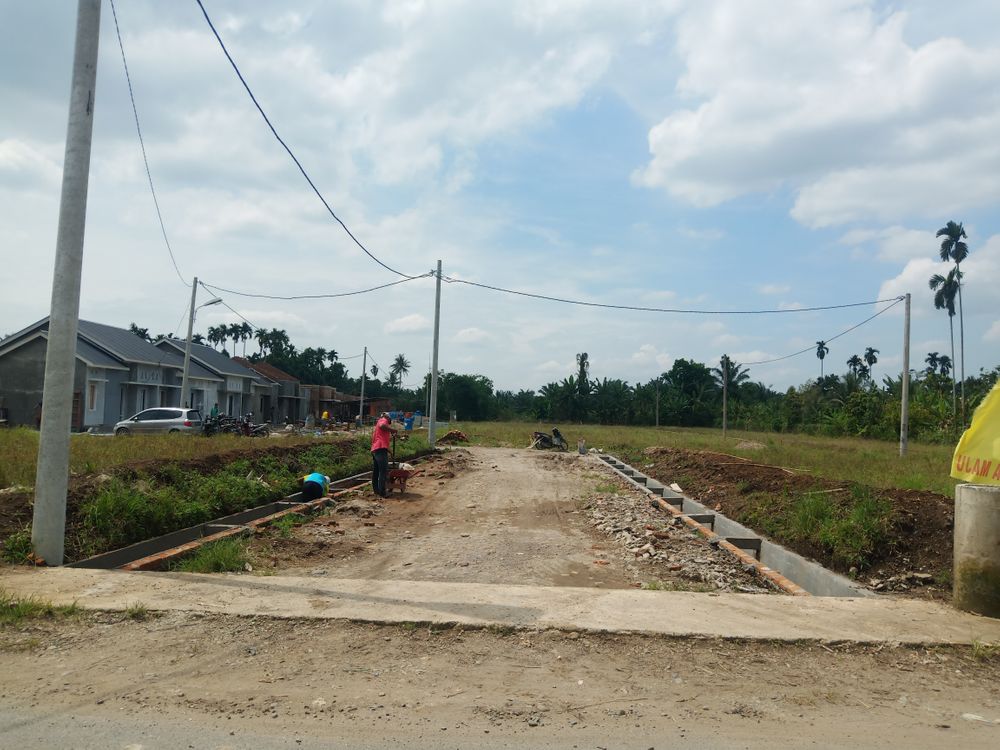 foto gerbang perumahan Asri Indah Suka Maju