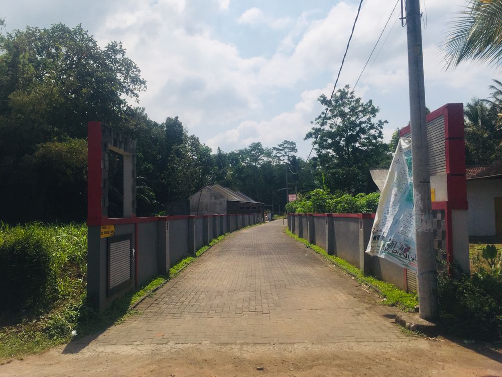 foto gerbang perumahan De Grand Land Turen