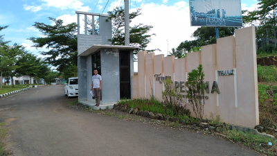 foto gerbang perumahan Taman Pesona Teluk