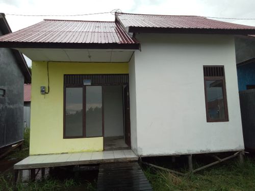 foto tampak rumah tipe RST.36/120 perumahan PERUMNAS PULAU TELO REGENCY