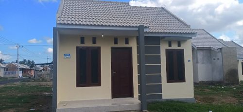 foto tampak rumah tipe KPR SUBSIDI perumahan Adi Mas Rogojampi Regency