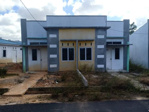 foto tampak rumah tipe RST 36/84 L perumahan Perumnas Baru Bumi Tanjung Permai 2
