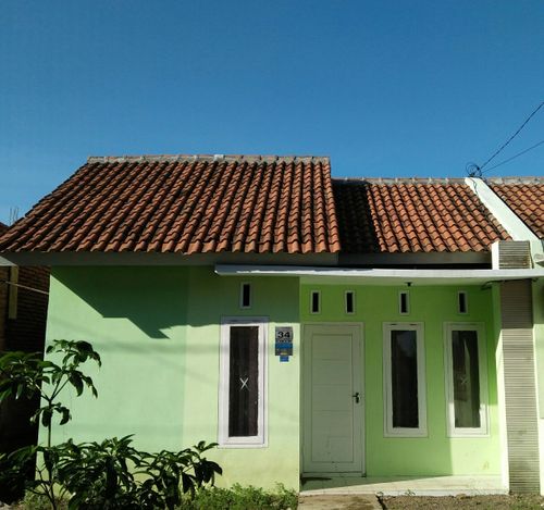 foto tampak rumah tipe RST.29A perumahan Perumnas Kalipuro Asri