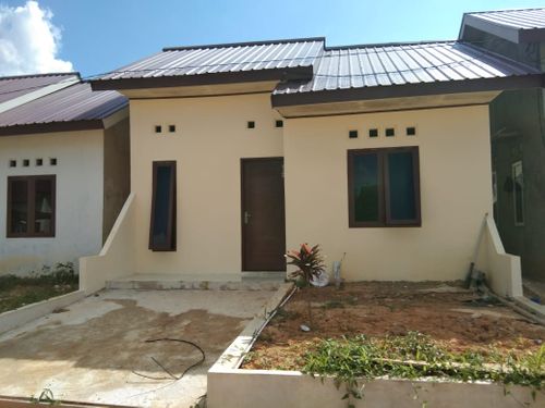 foto tampak rumah tipe 36/84 perumahan PERUMAHAN PURI KARANG JOANG
