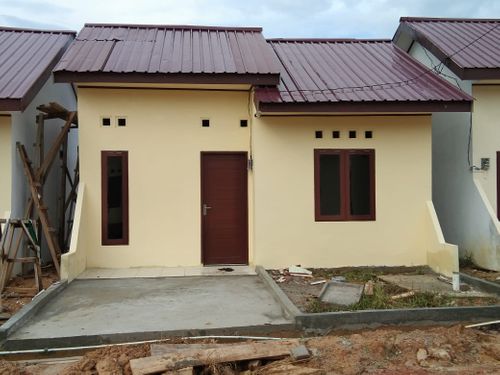 foto tampak rumah tipe 36/84 perumahan PERUMAHAN PURI KARANG JOANG