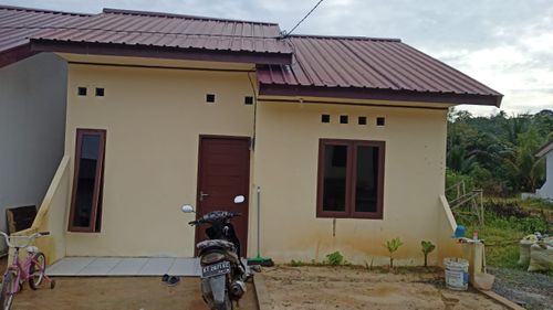 foto tampak rumah tipe 36/84 perumahan PERUMAHAN PURI KARANG JOANG