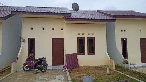 foto tampak rumah tipe 36/84 perumahan PERUMAHAN PURI KARANG JOANG