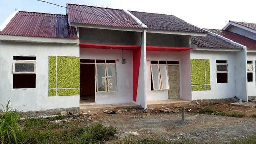 foto tampak rumah tipe Warkomi EXT perumahan FAJAR SOWI DAMAI