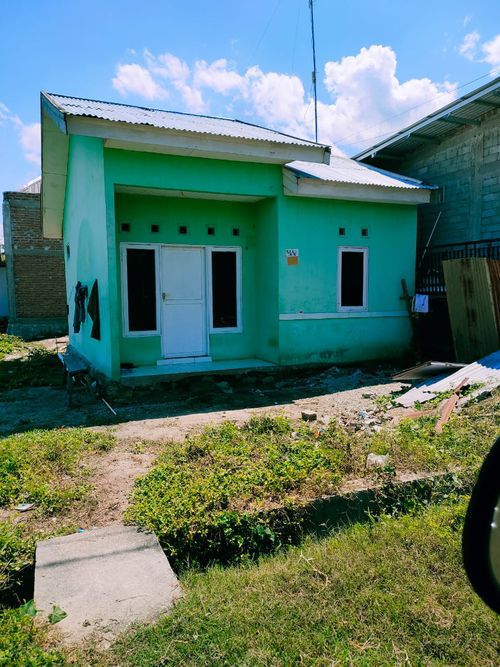 foto tampak rumah tipe RSt/170 perumahan PERUMAHAN BUMI KAWATUNA KENCANA