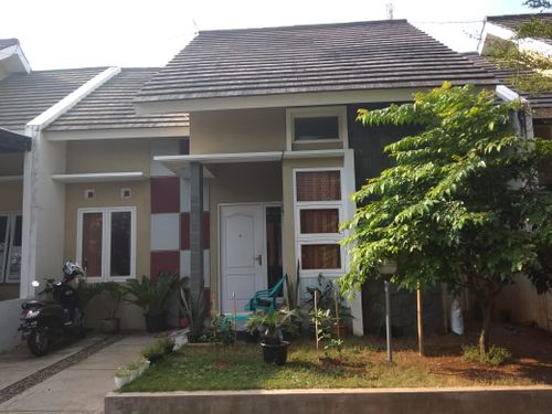 foto tampak rumah tipe 58/102 perumahan KHARISMA REGENCY