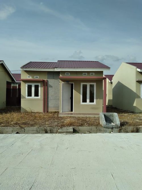 foto tampak rumah tipe 36/108 perumahan PERMATA INDAH REGENCY 