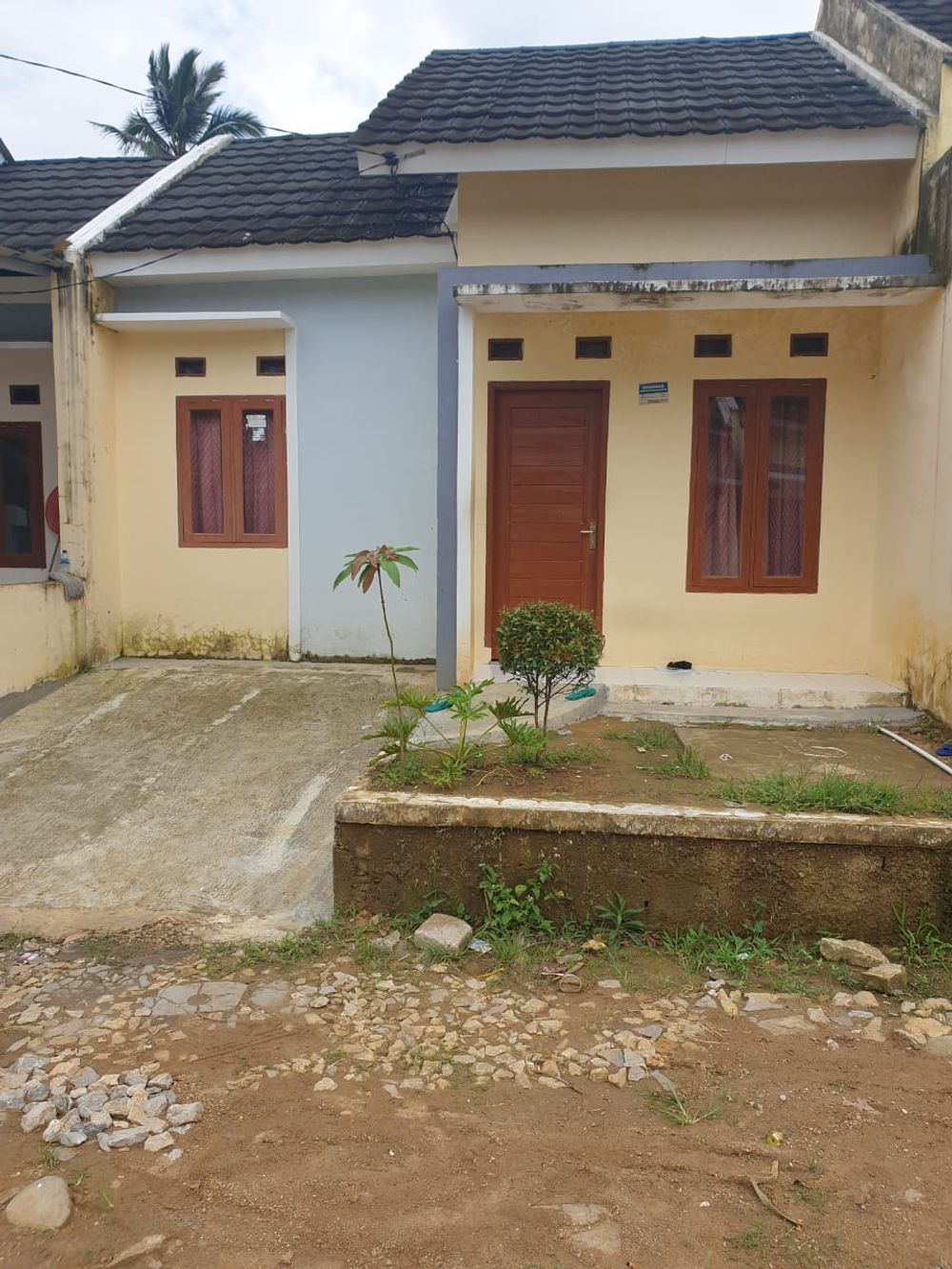 foto tampak rumah tipe Flamboyan perumahan Pesona Gisti Asri