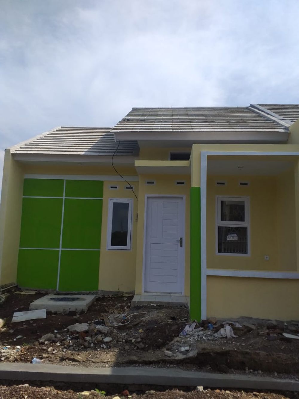 foto tampak rumah tipe 36/60 perumahan GRAND HOUSE RESIDENCE CLUSTER AS-SALAAM