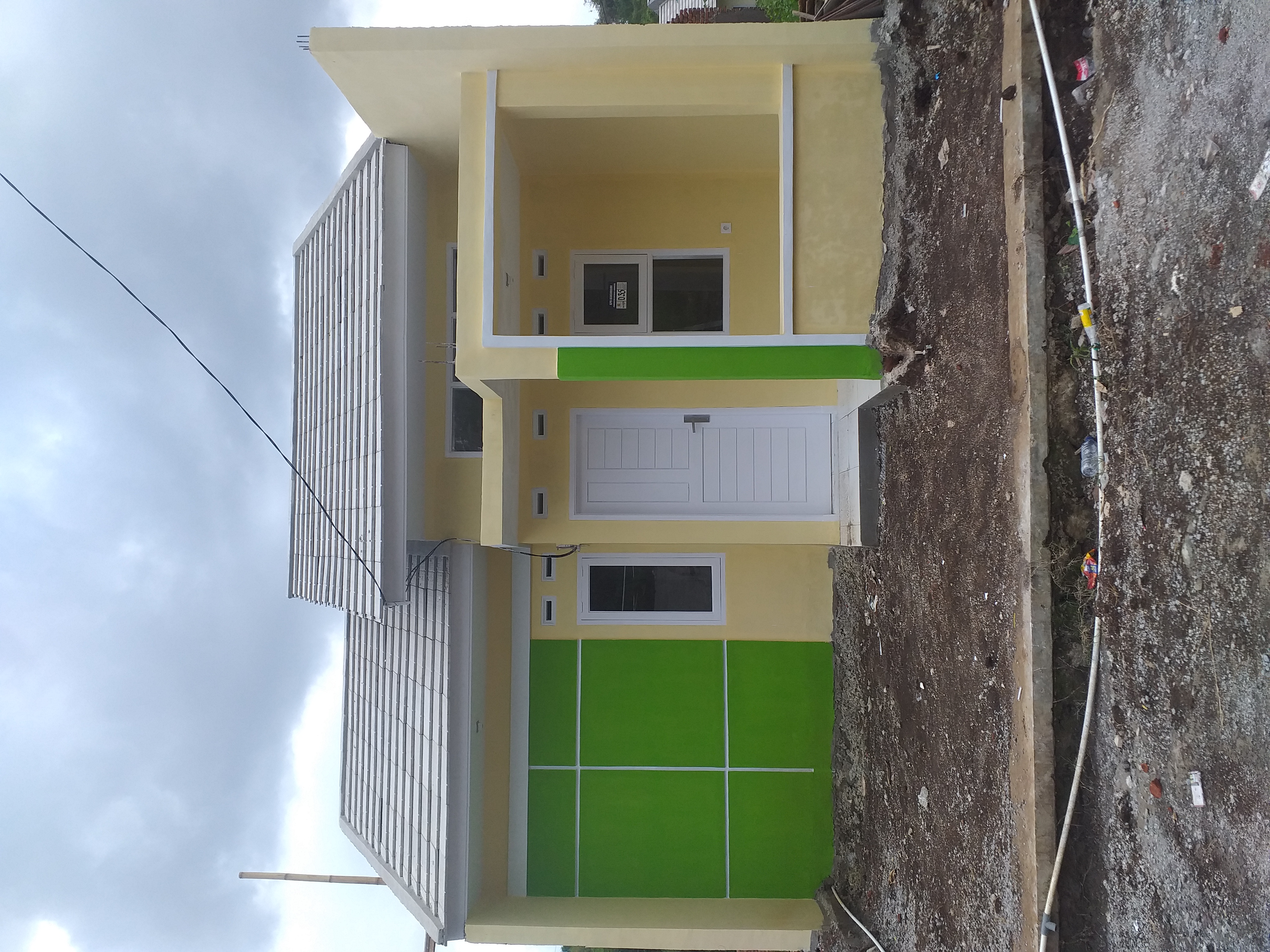 foto tampak rumah tipe 36/66 perumahan GRAND HOUSE RESIDENCE CLUSTER AS-SALAAM
