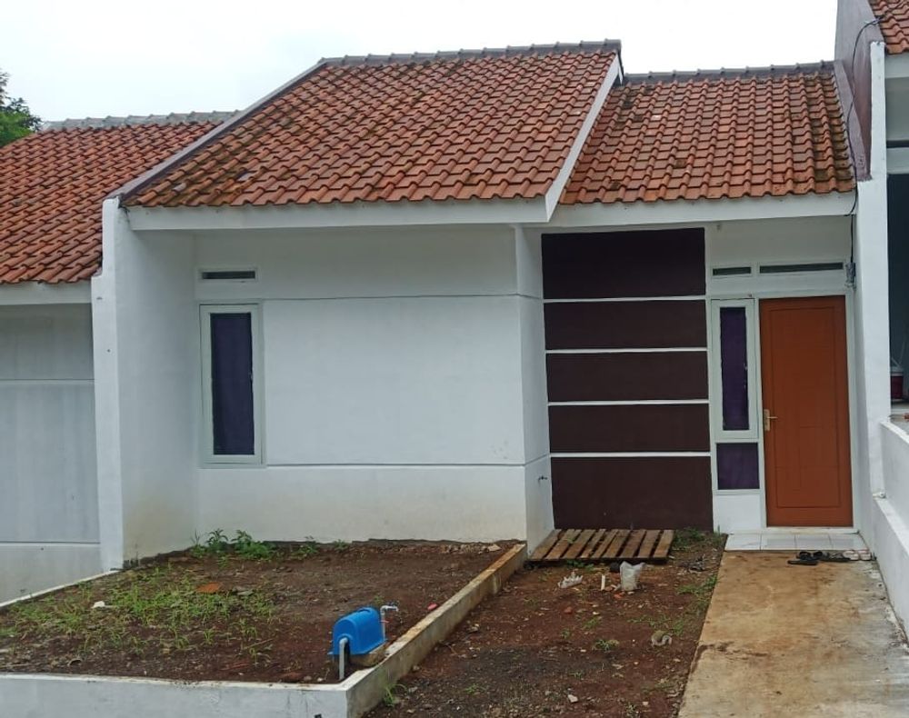 foto tampak rumah tipe NIRWANA 2 perumahan PURI NIRWANA CIAMBAR