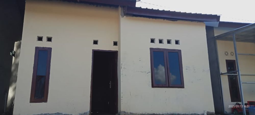 foto tampak rumah tipe 36/84 perumahan PERUMAHAN PURI KARANG JOANG