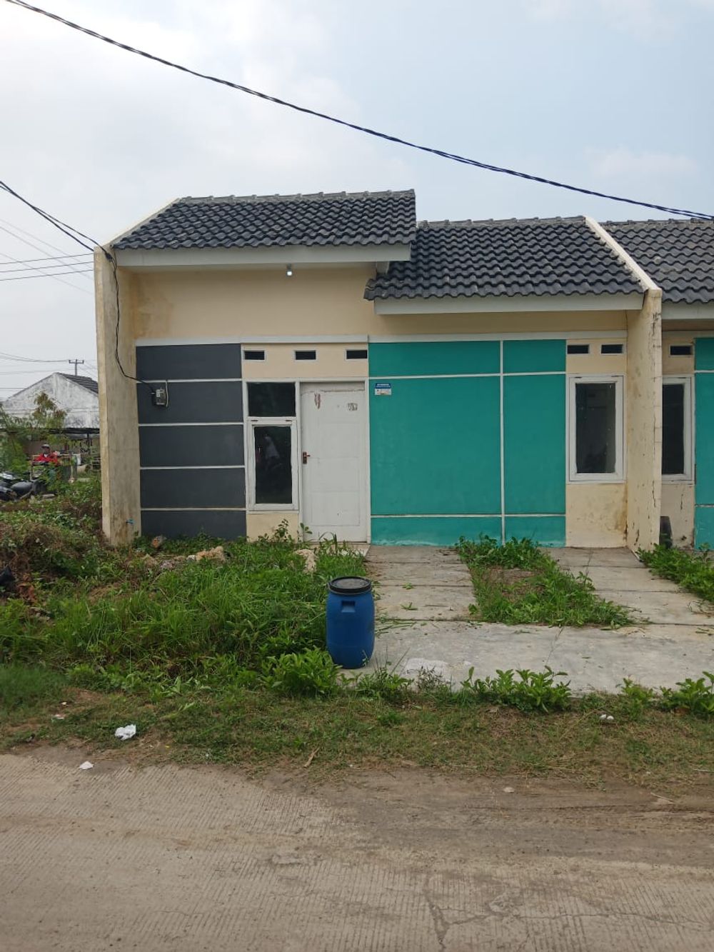 foto tampak rumah tipe MANINJAU 3 perumahan Cikarang Lake View