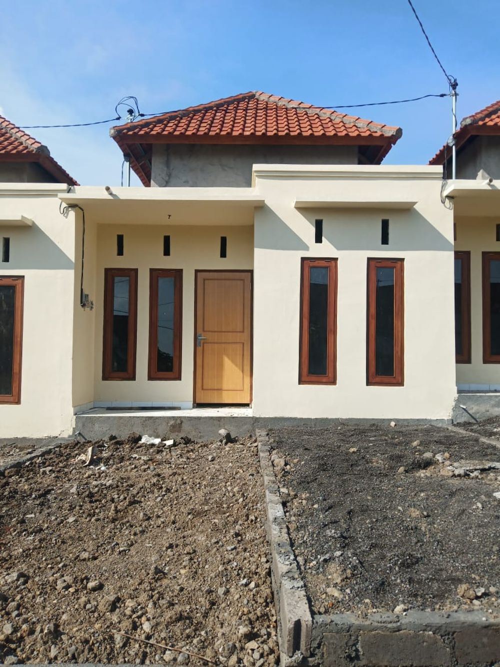 foto tampak rumah tipe 25 perumahan BCA LAND SANG-SANG