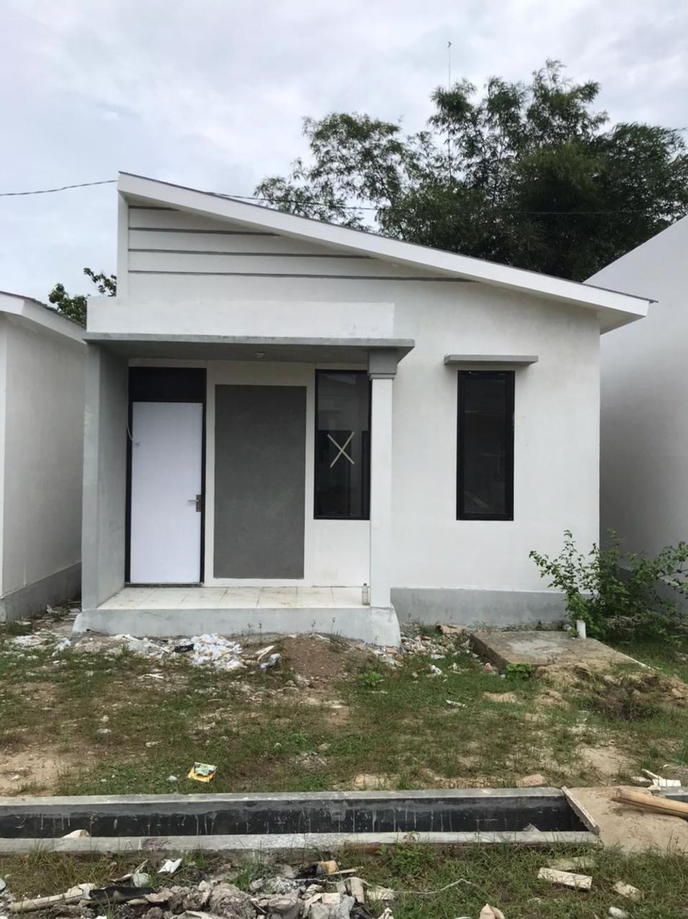 foto tampak rumah tipe 36 perumahan PERUMAHAN ISTANA BUKIT KELAPA II
