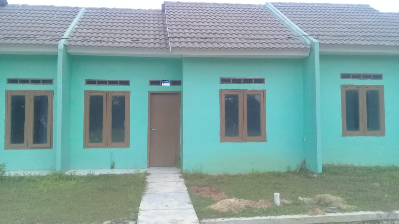 foto tampak rumah tipe Rumah perumahan TRIRAKSA VILLAGE 2