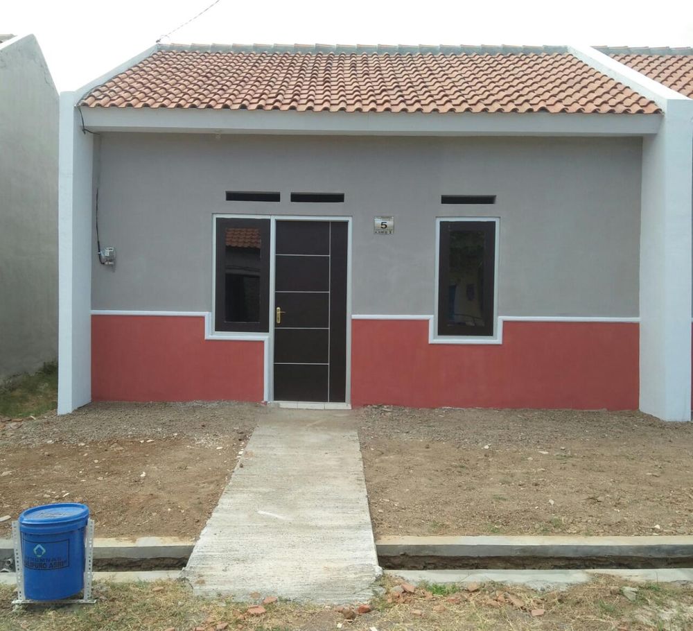 foto tampak rumah tipe RST 30 PLUS perumahan Perumnas Kalipuro Asri