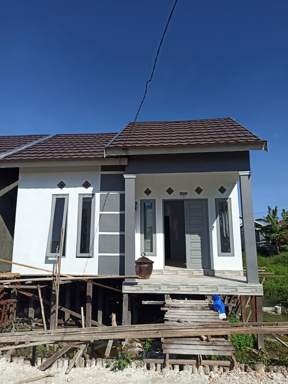 foto tampak rumah tipe A. Wahab Syarani perumahan Bumi wahyu utama IX Tahap 2