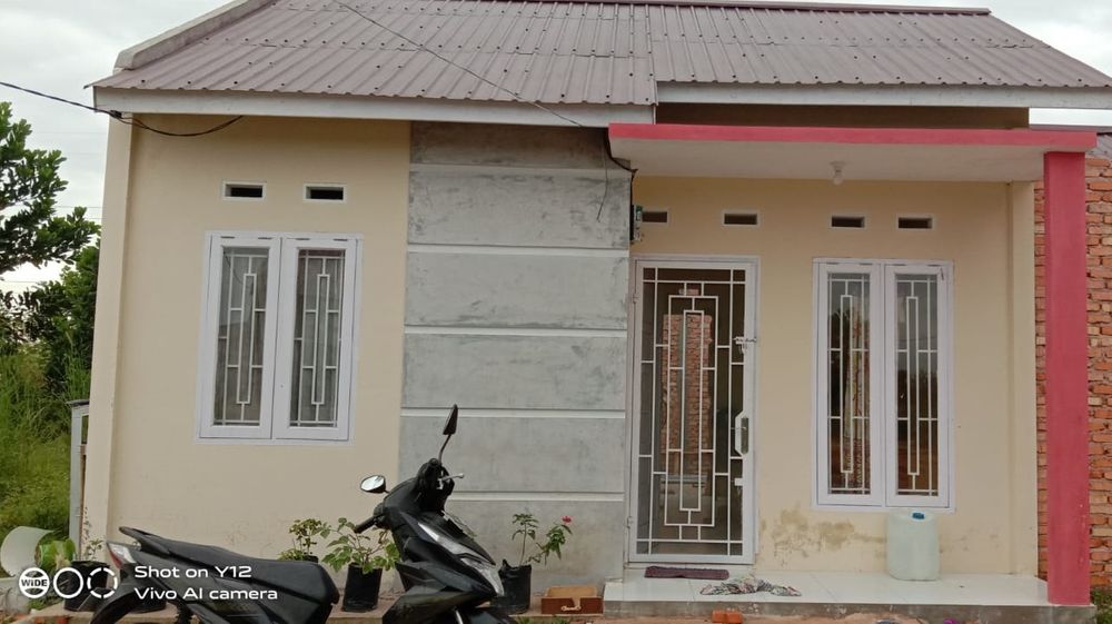 foto tampak rumah tipe 36 perumahan Griya Thasmir Damai