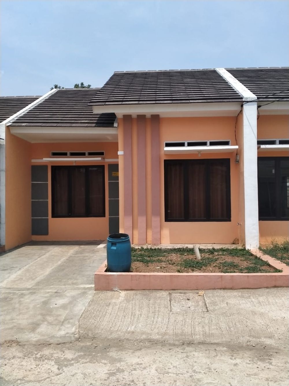 foto tampak rumah tipe 36/88 perumahan GRAND CIBENING RESIDENCE