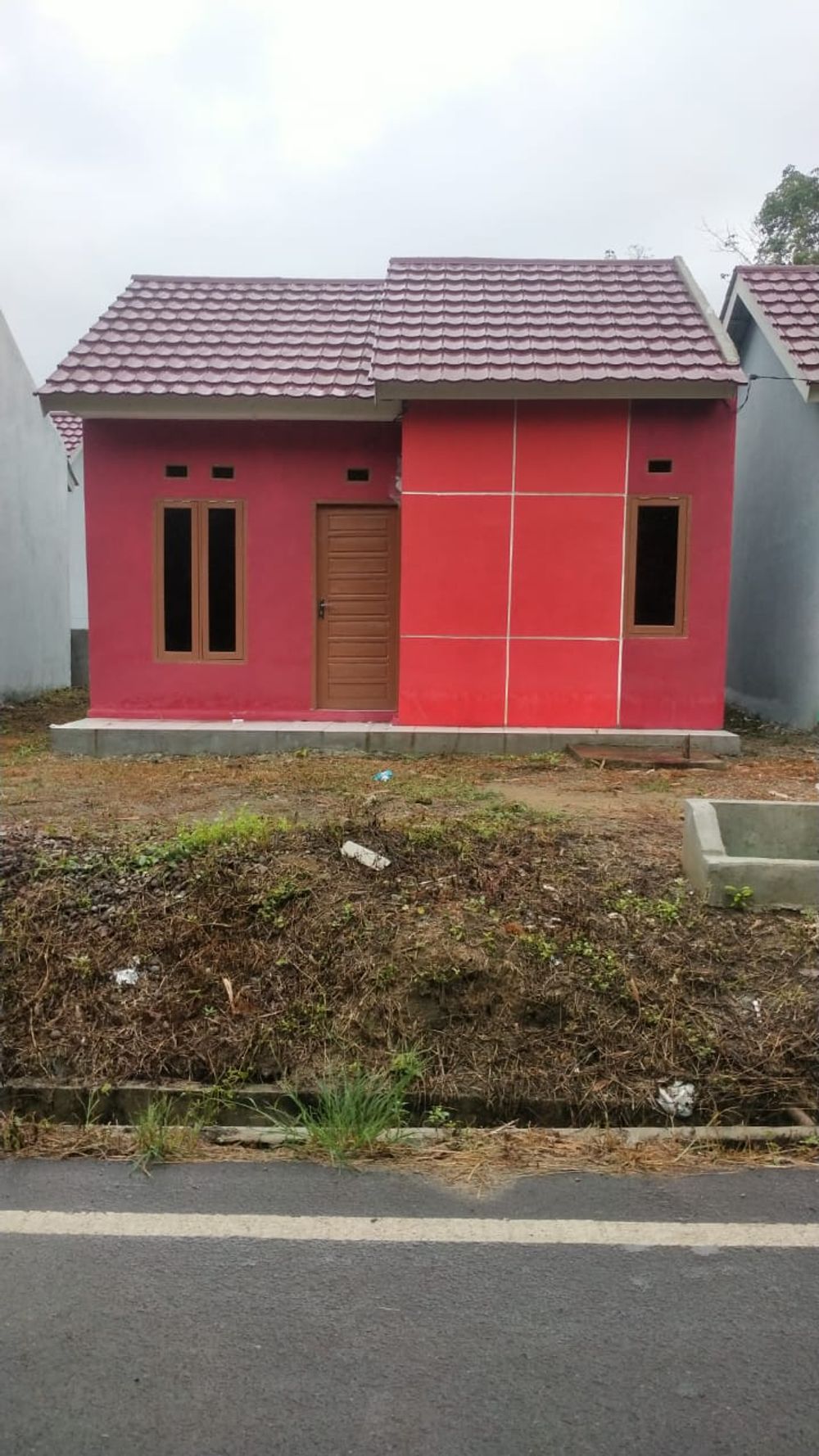 foto tampak rumah tipe 36/96 perumahan KARANG JAYA INDAH