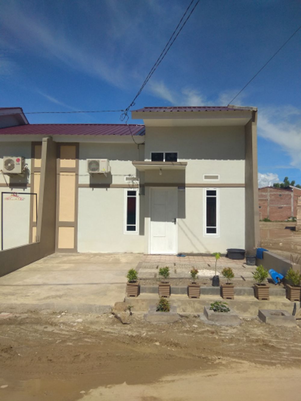 foto tampak rumah tipe 36 perumahan BINA RESIDENCE PERMAI