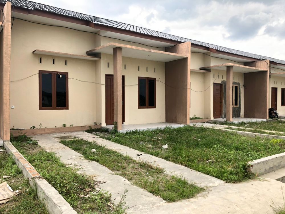 foto tampak rumah tipe A perumahan PESONA MARTUBUNG