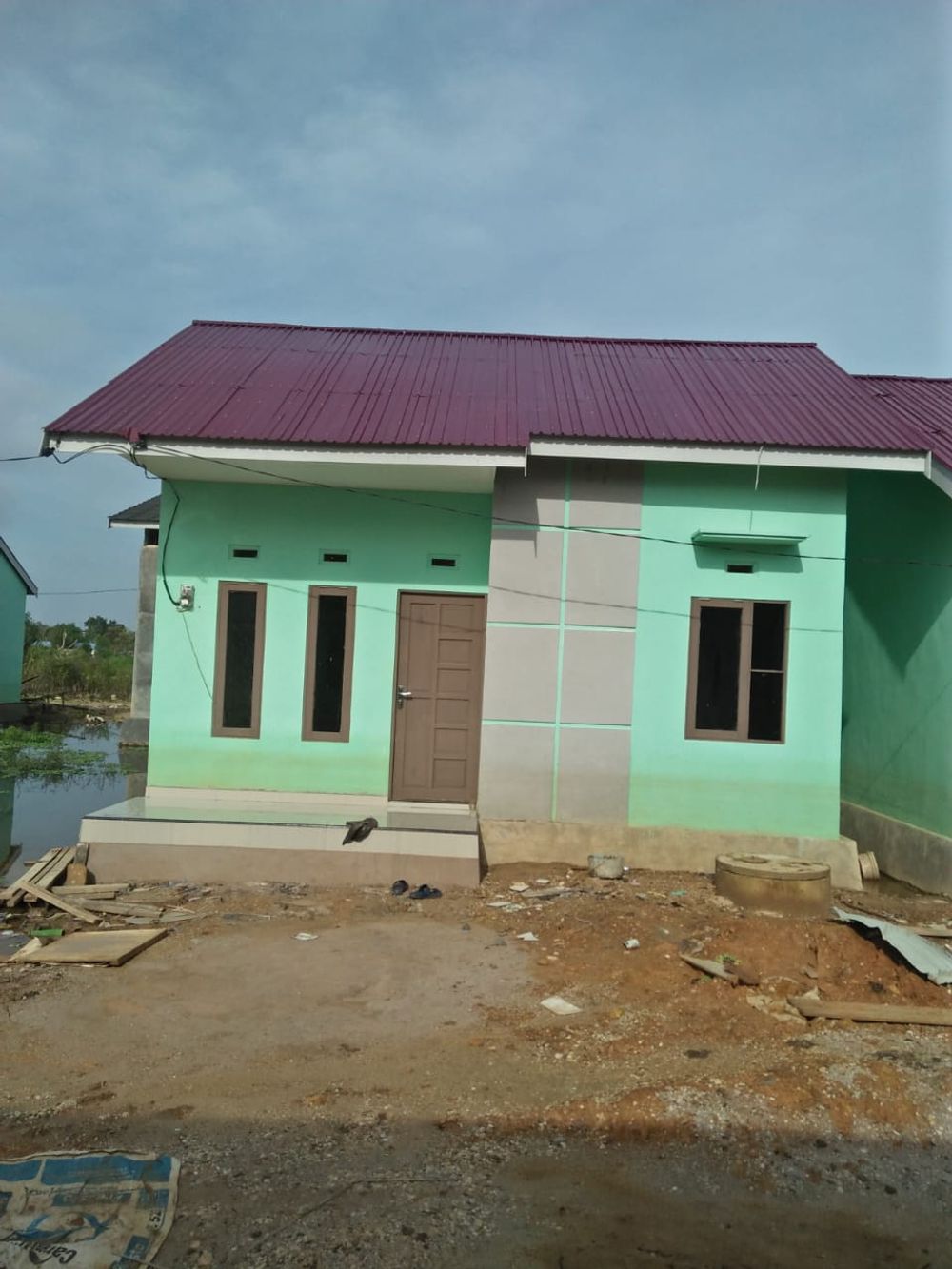 foto tampak rumah tipe 36 perumahan MAHKOTA RIDILLA 10 TAHAP 3