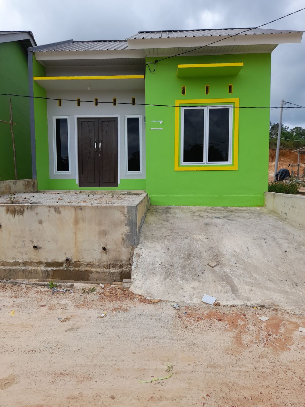 foto tampak rumah tipe 36/95 perumahan GREEN HILL 2