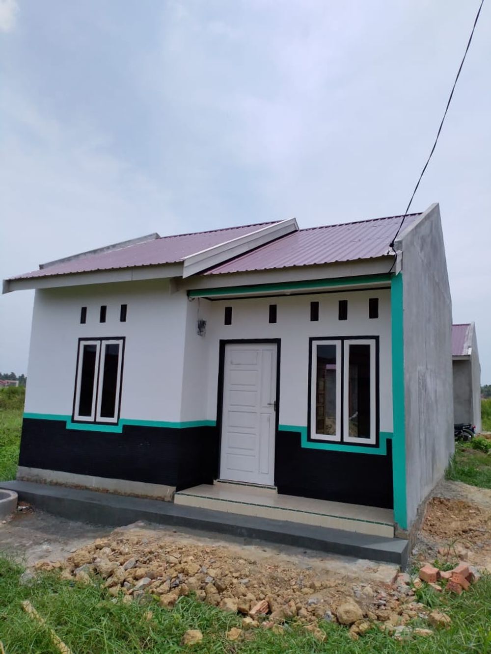 foto tampak rumah tipe RSH 36 perumahan berlian