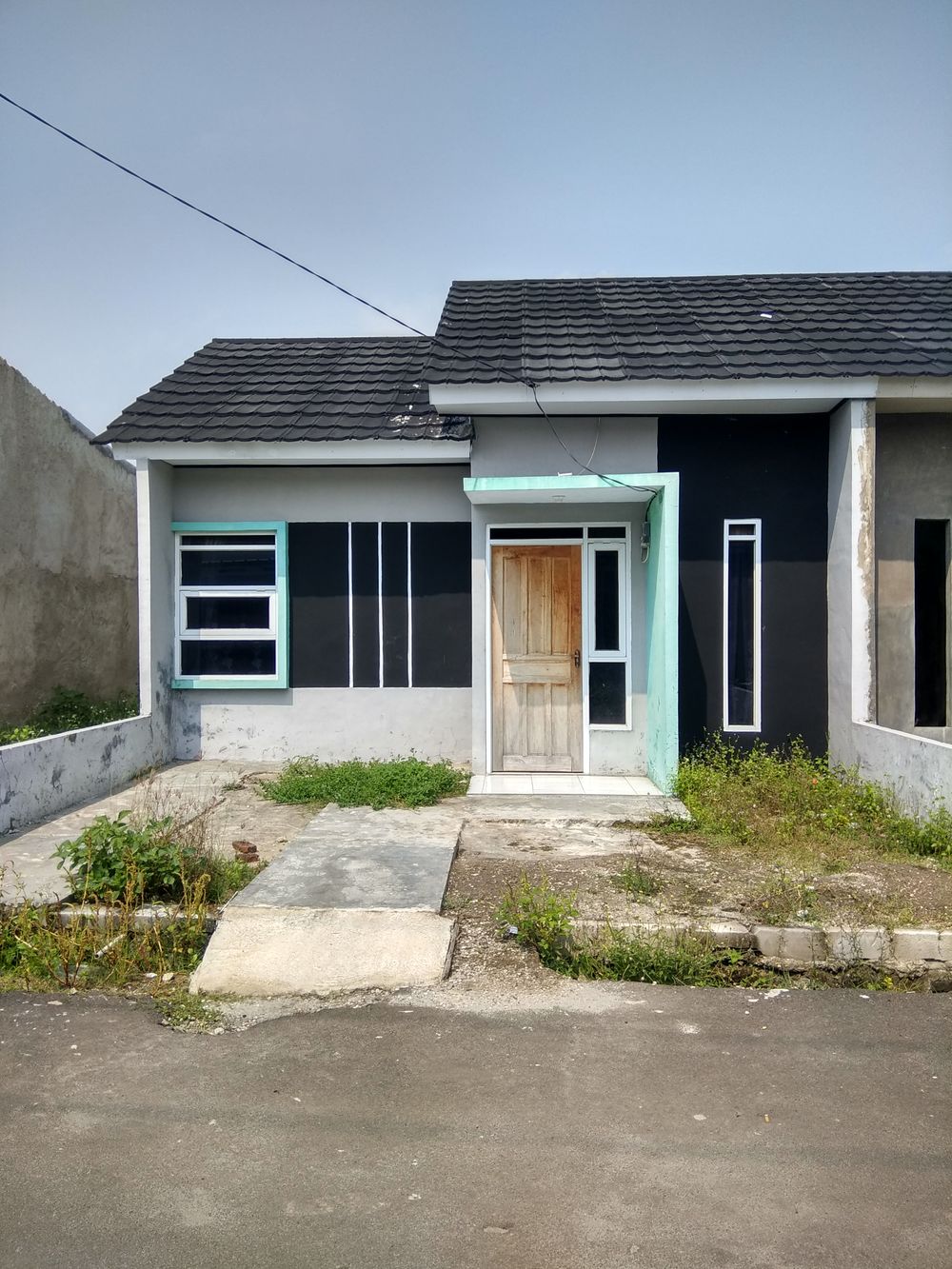 foto tampak rumah tipe KPR SUBSIDI perumahan MITRALAND PURI KERATON