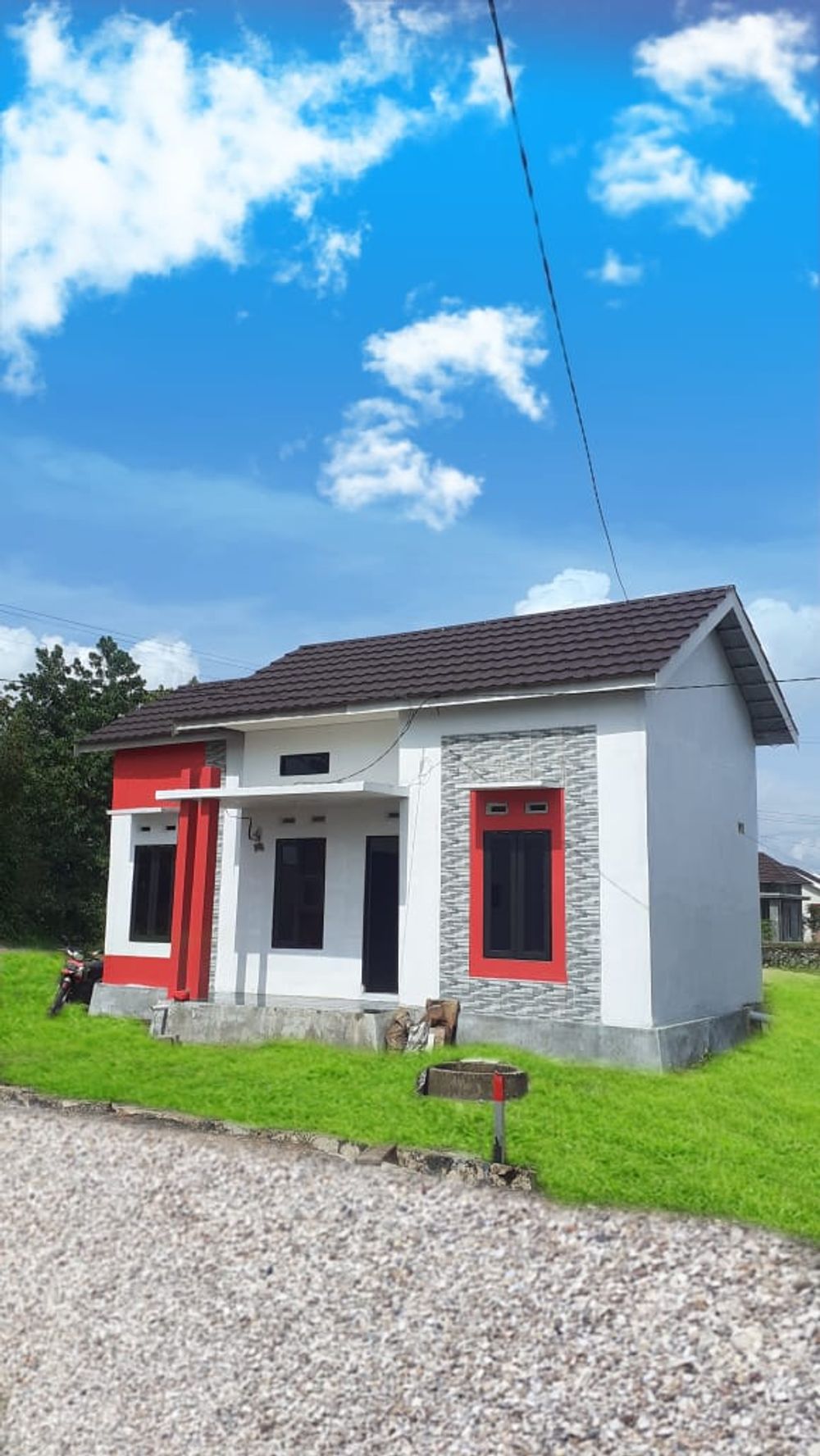 foto tampak rumah tipe 36 perumahan Pelangi Kasturi 2